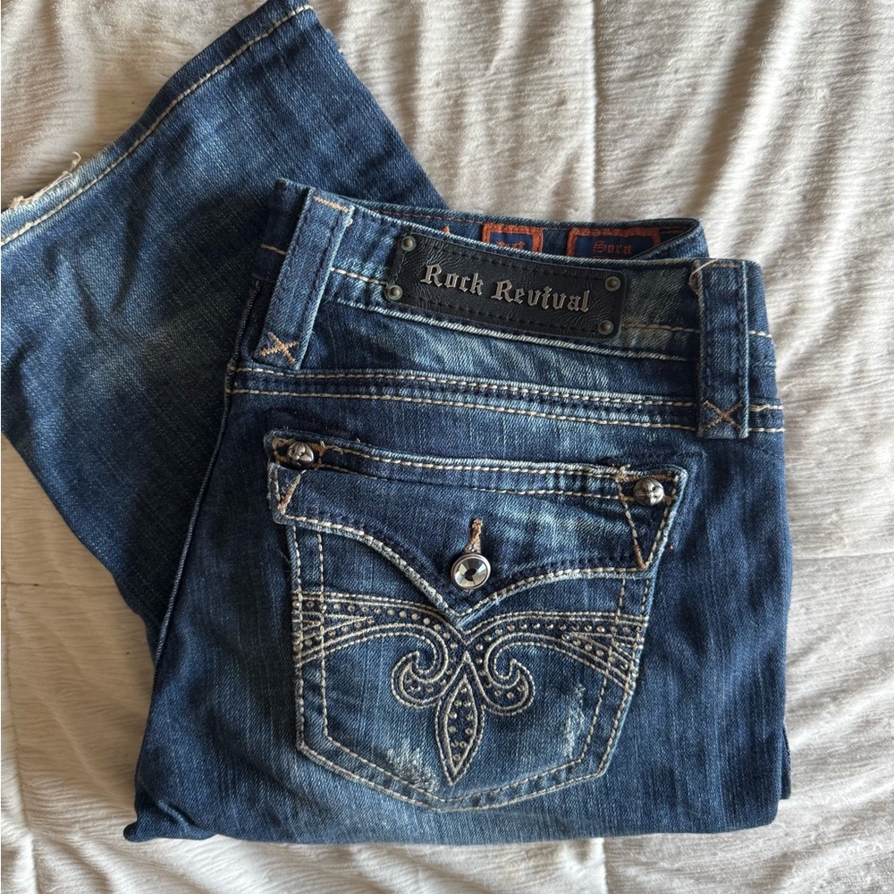 Rock Revival Blue Boot Cut Jeans with Distinctive Stitching